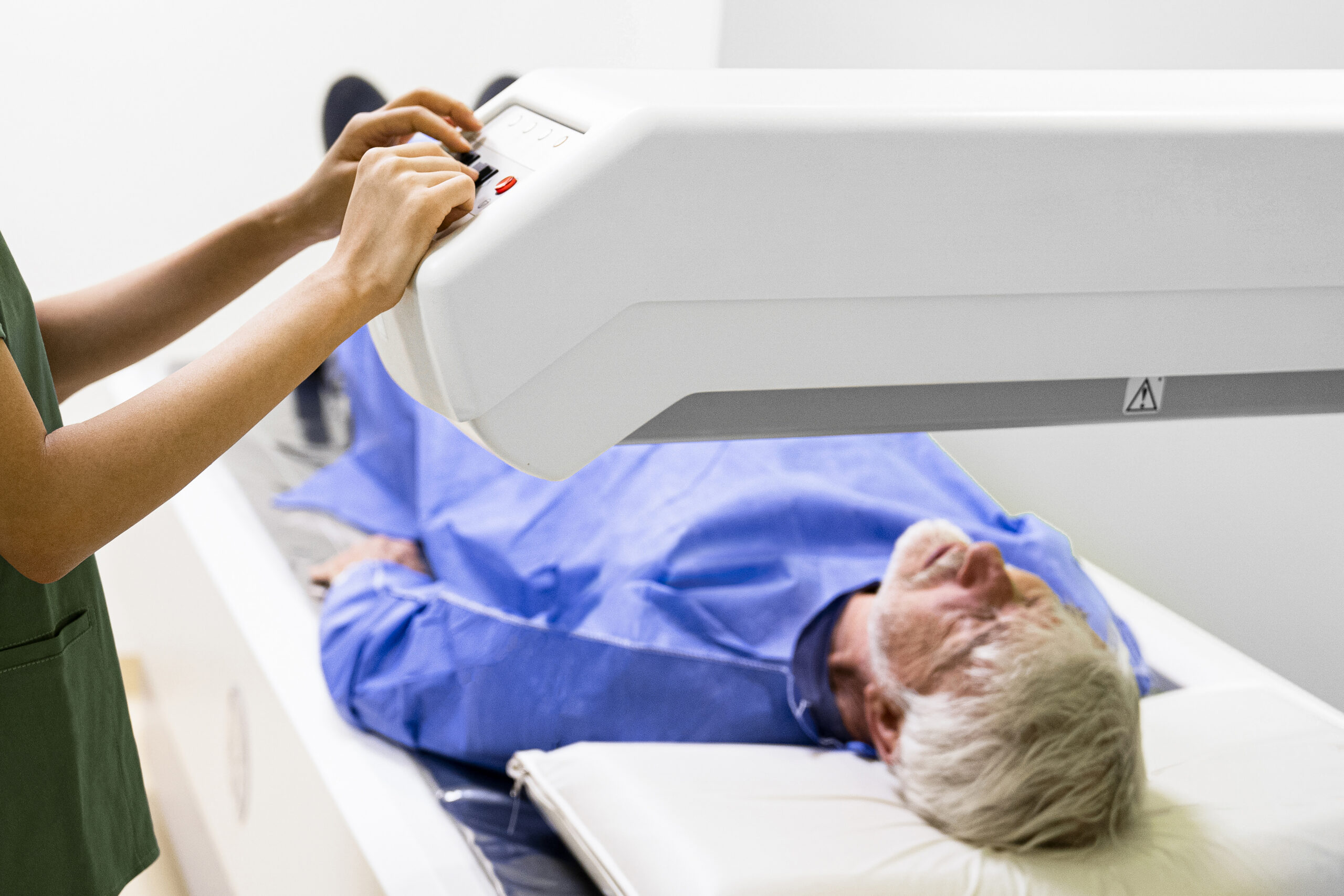 Senior in Kelowna undergoing DEXA scan to monitor bone density for active lifestyle